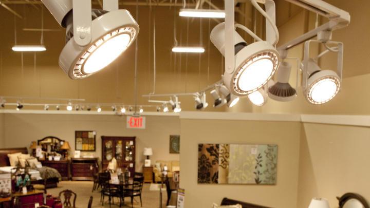 Ashley Furniture HomeStore lit with Track heads using LED Lamps